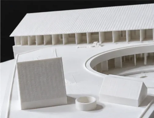 Toiture à sheds et façade rythmée d'une maquette d'architecture imprimée en 3D